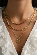 Gold Rope Chain Necklace by Sami Jewels, featuring a stylish and shiny textured rope design worn as a fashionable jewelry accessory.
