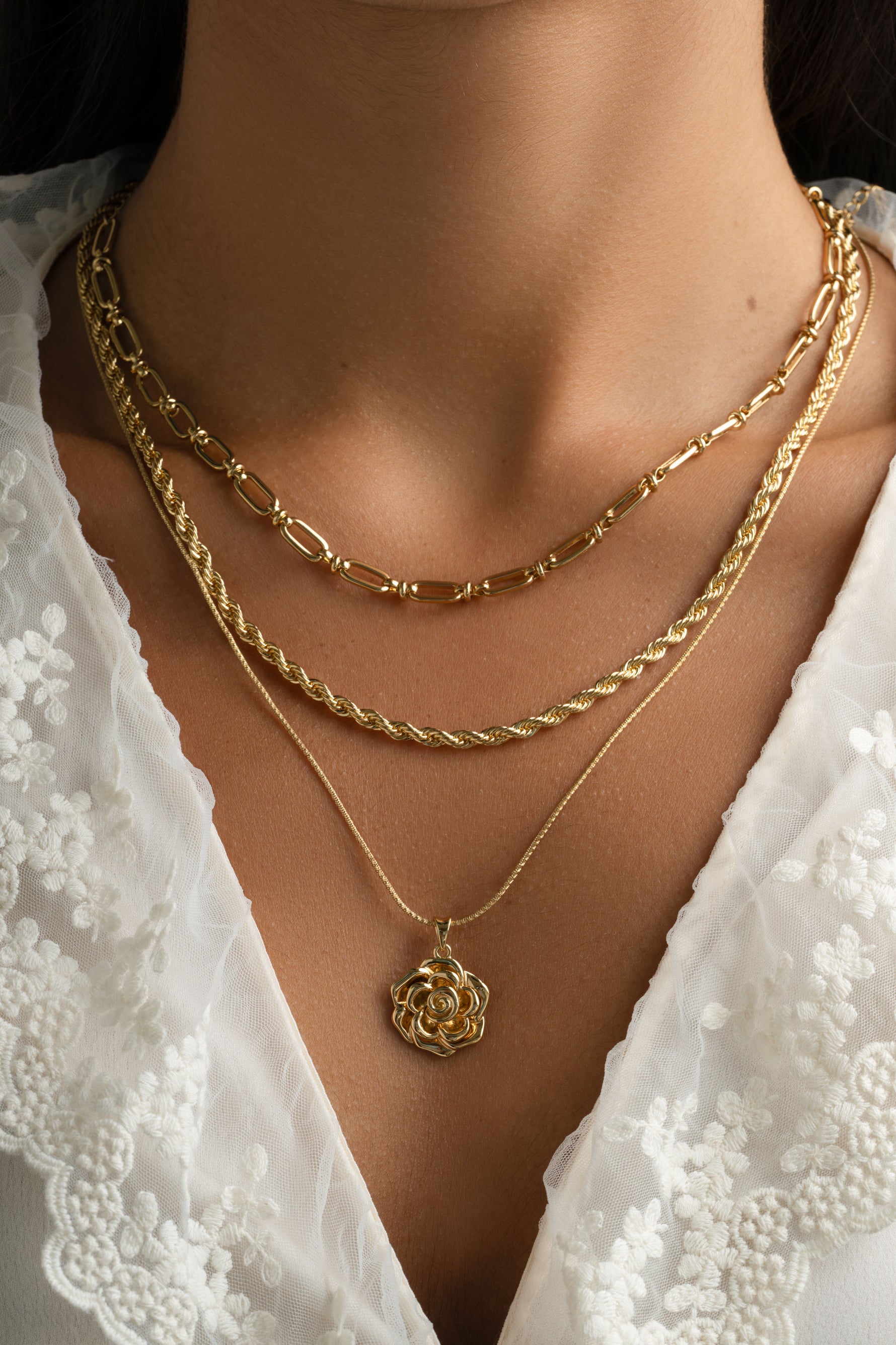 Gold Rope Chain Necklace by Sami Jewels, featuring a stylish and shiny textured rope design worn as a fashionable jewelry accessory.