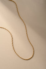 Gold Rope Chain Necklace from Sami Jewels, featuring a detailed twisted rope design and polished finish.