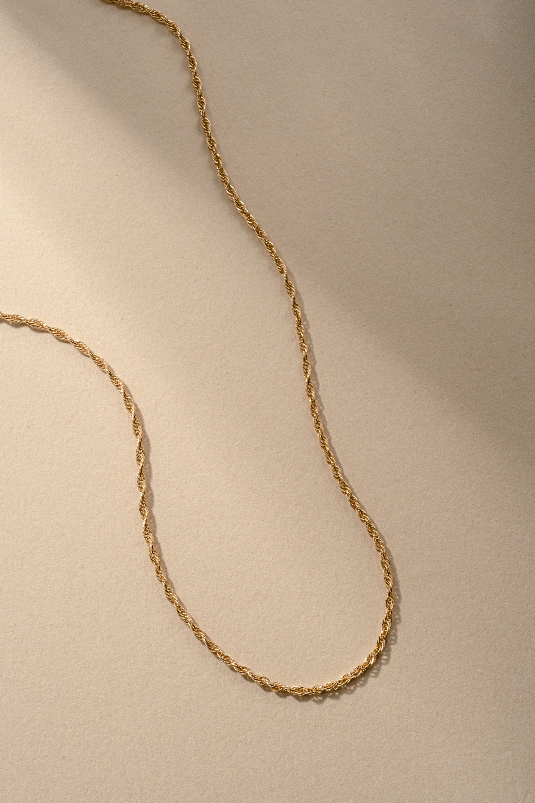 Gold Rope Chain Necklace from Sami Jewels, featuring a detailed twisted rope design and polished finish.
