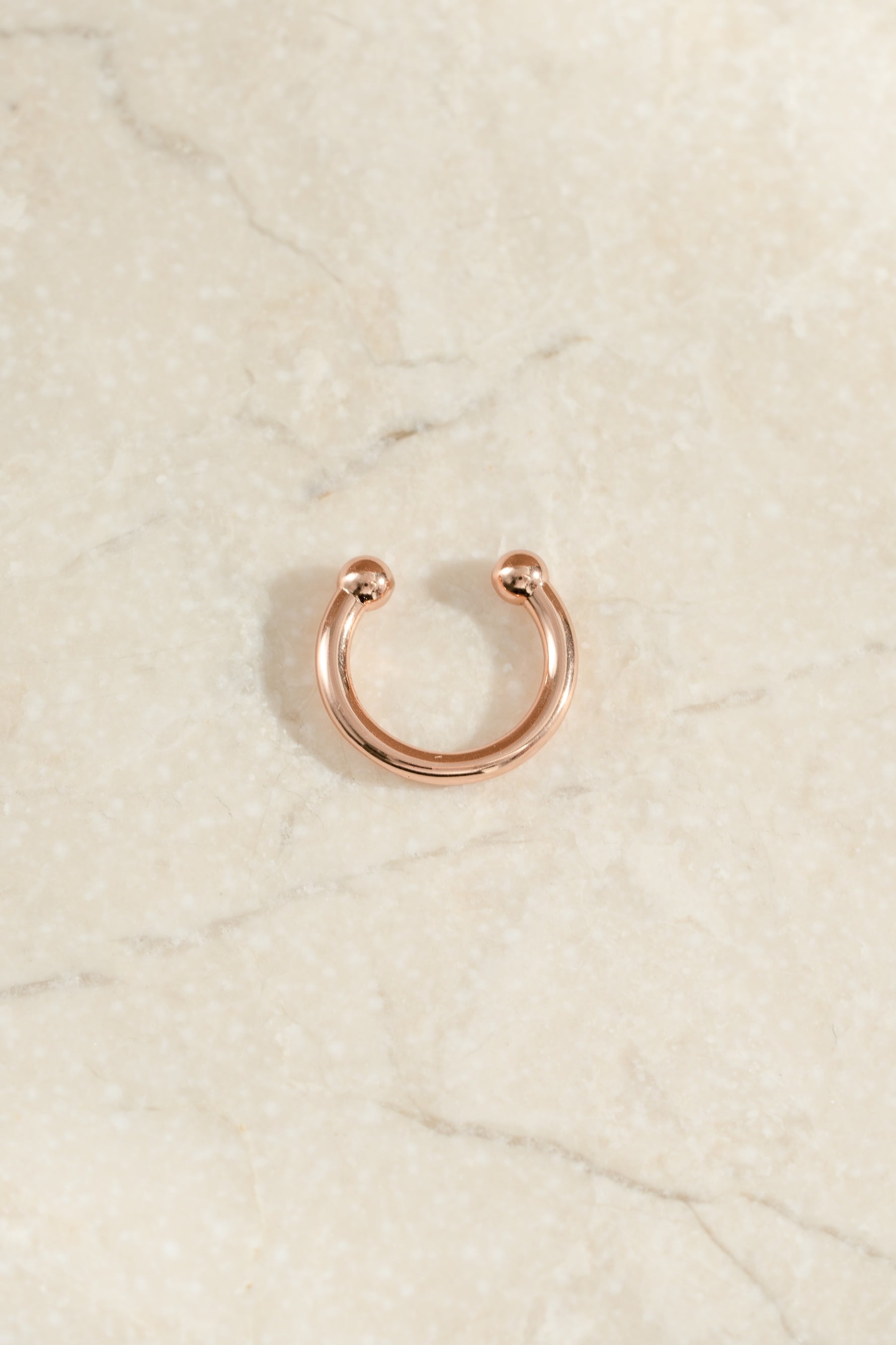 rose gold plated plain ear cuff simple background