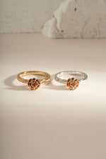 Gold and sterling silver rose ring by Sami Jewels featuring a detailed rose design on a delicate band.