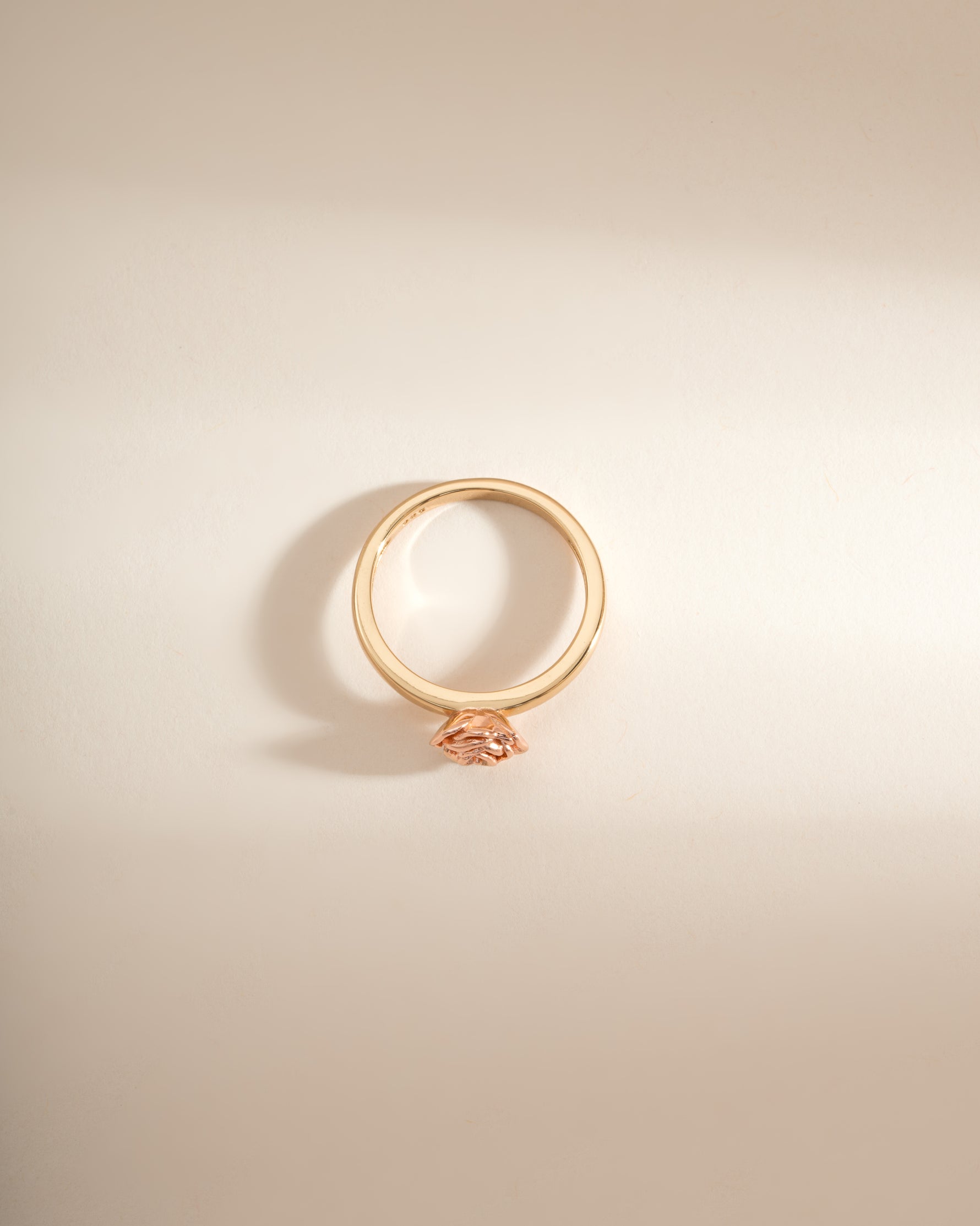 Gold rose ring by Sami Jewels, top view showing intricate floral design and polished finish.