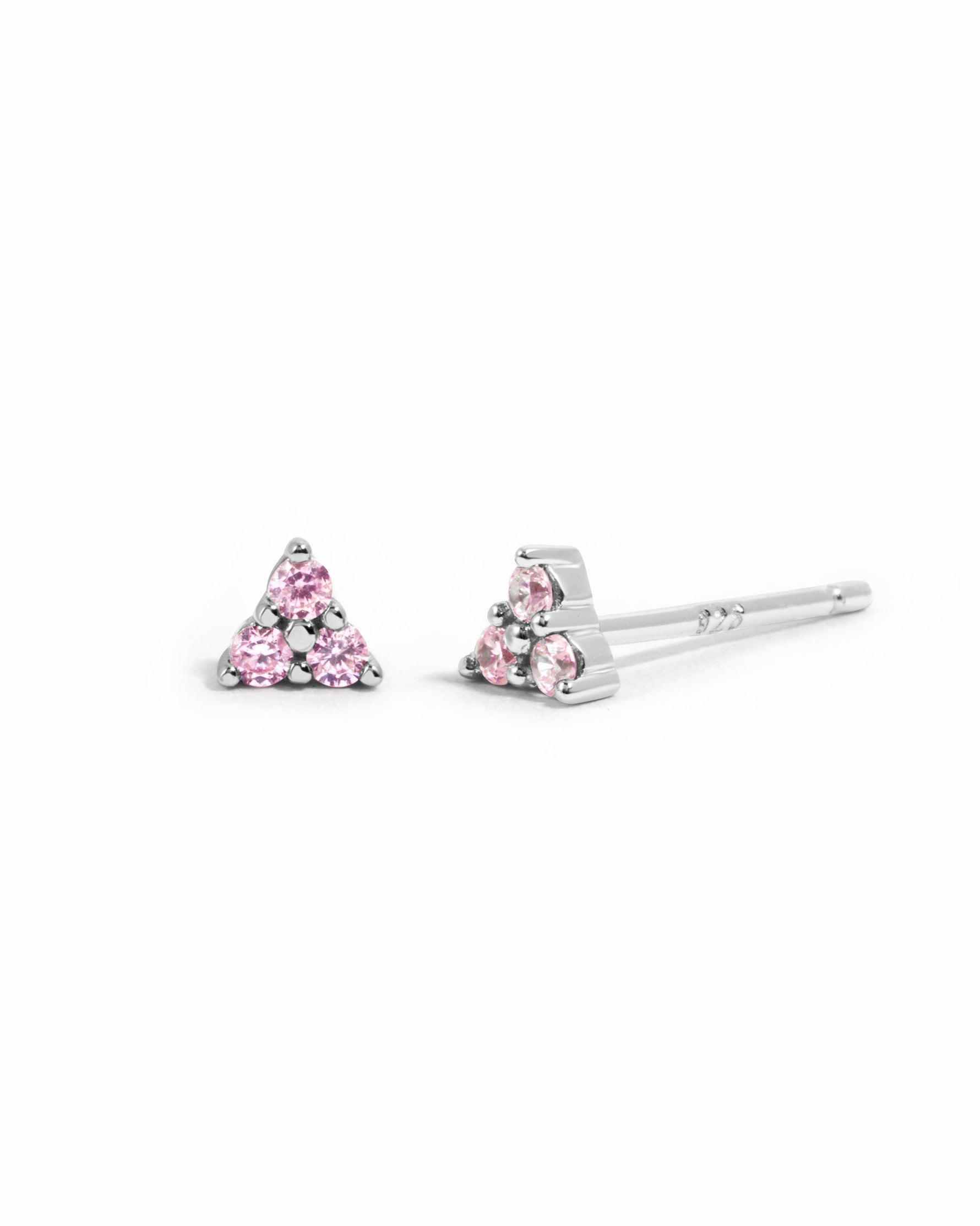 Sterling silver Tiny Rose 3 Stone Stud Earrings by Sami Jewels featuring small rose-shaped design and three sparkling stones.