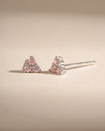 Sterling silver Tiny Rose 3 Stone Stud Earrings by Sami Jewels featuring small rose-shaped design with three sparkling stones.
