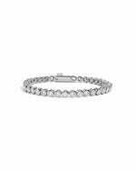 round bezel diamond tennis bracelet, 3mm in silver on a white background