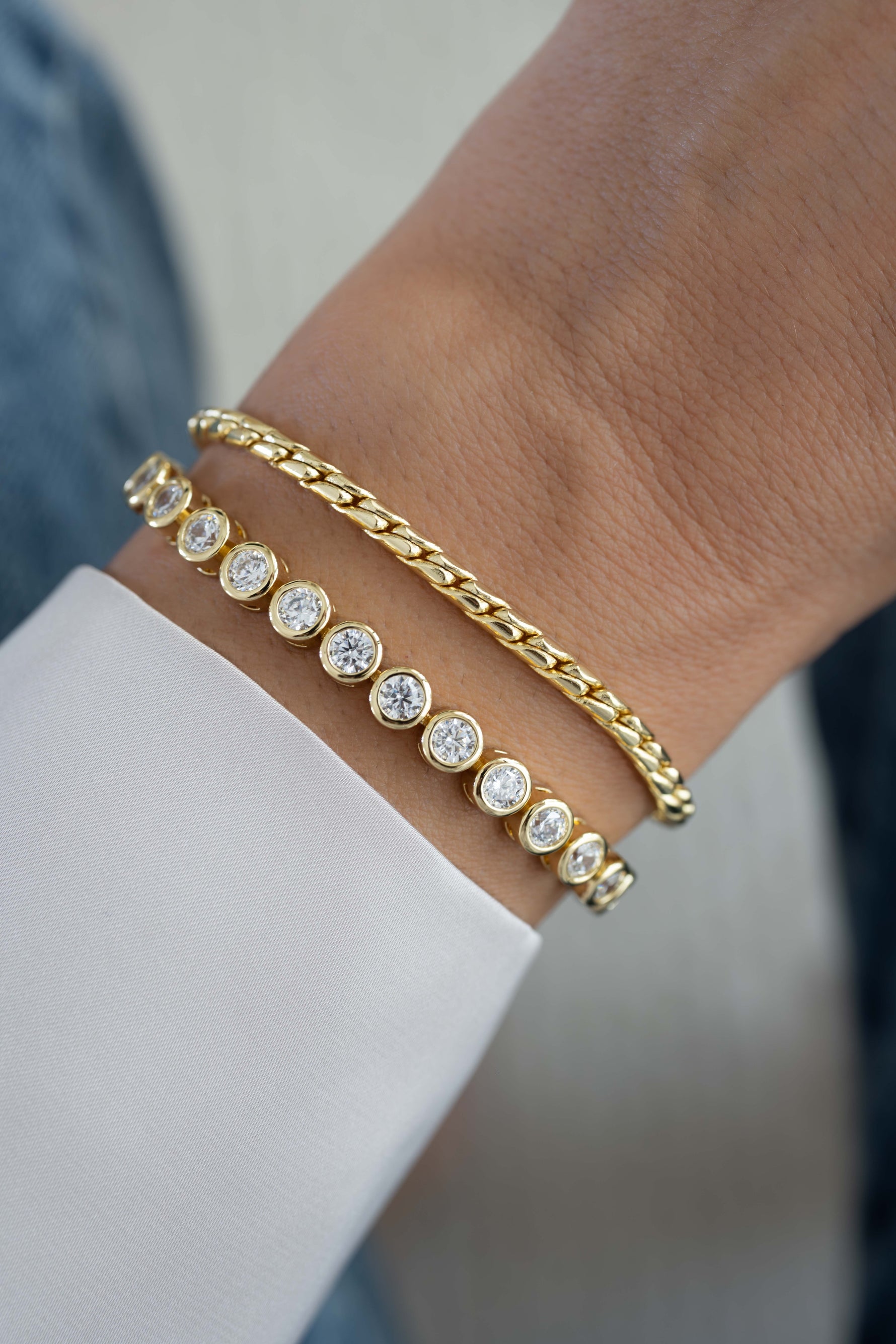 round bezel diamond tennis bracelet in 4mm gold bracelet stack on models wrist