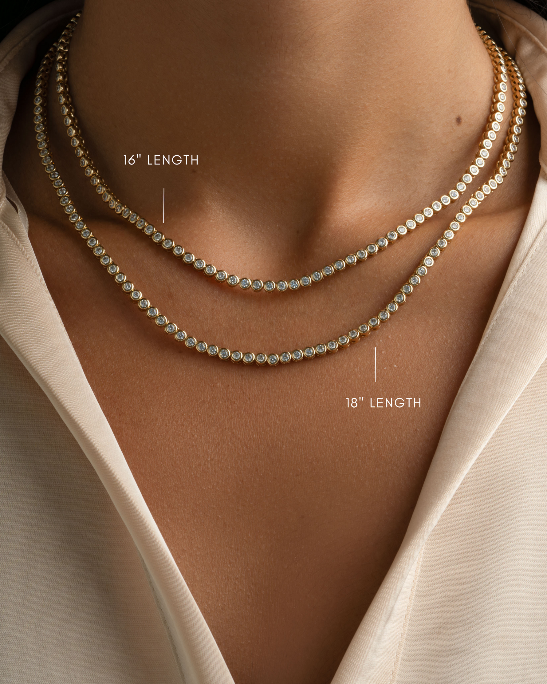 Gold 2.5mm round bezel tennis necklace by Sami Jewels, featuring a sleek design in varying lengths.