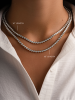 Silver 3mm round bezel tennis necklace by Sami Jewels displayed on a model with varying necklace lengths.