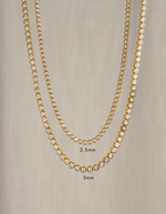 Gold 2.5mm round bezel tennis necklace by Sami Jewels featuring a sleek, elegant design with evenly spaced round beads.