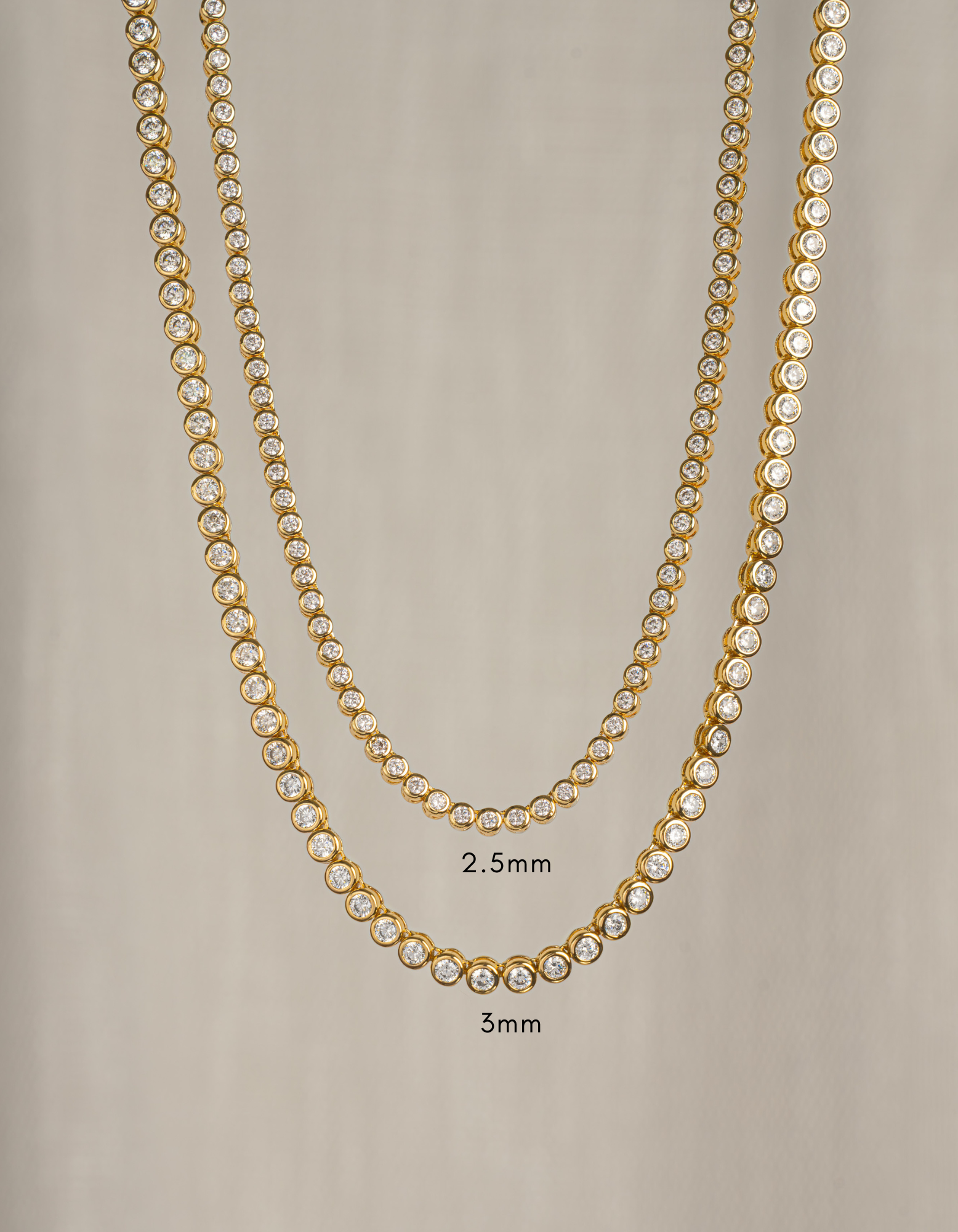 Gold 2.5mm round bezel tennis necklace by Sami Jewels featuring a sleek, elegant design with evenly spaced round beads.
