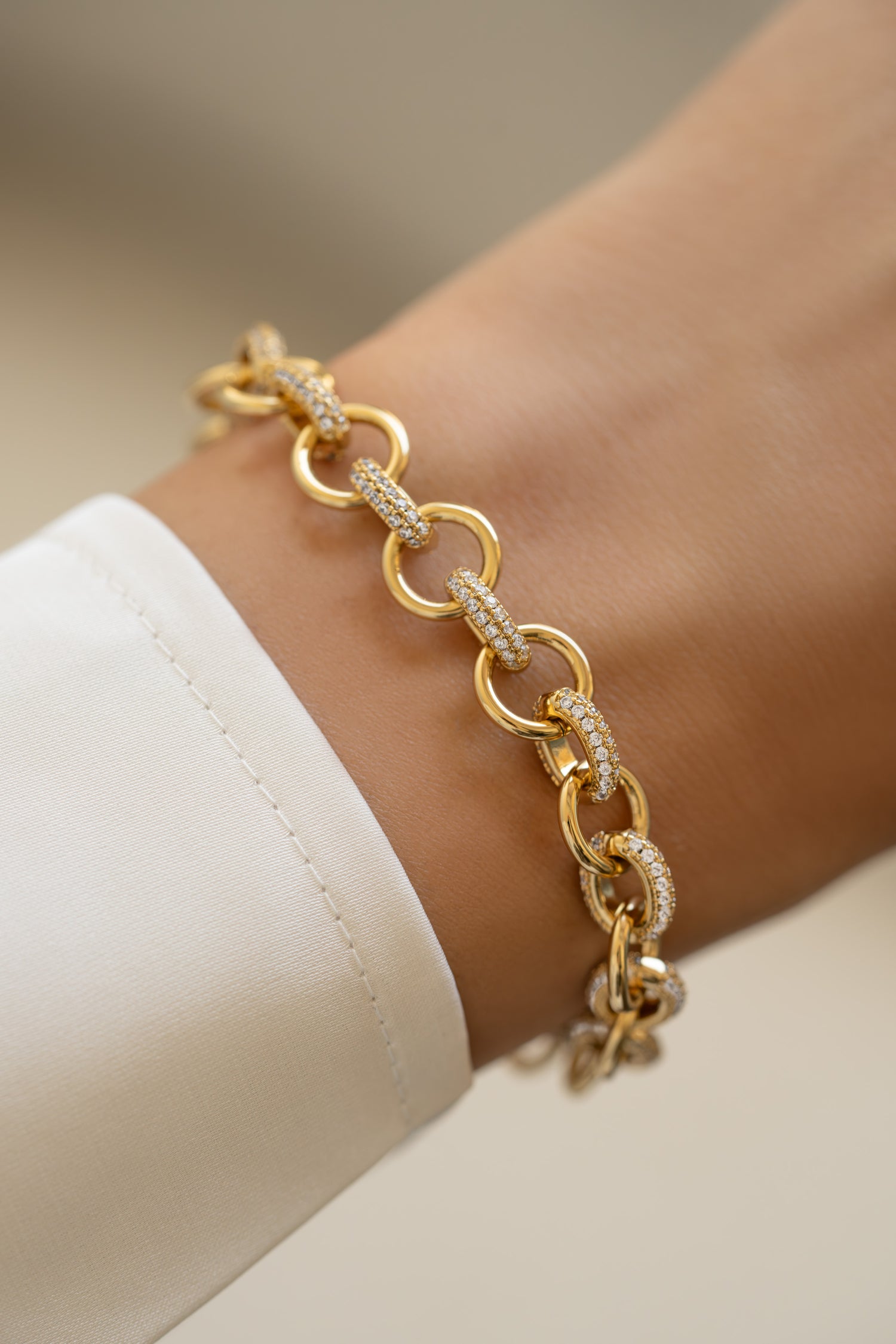 Gold Sami Jewels round pave link bracelet featuring a chain design with sparkling pave accents.