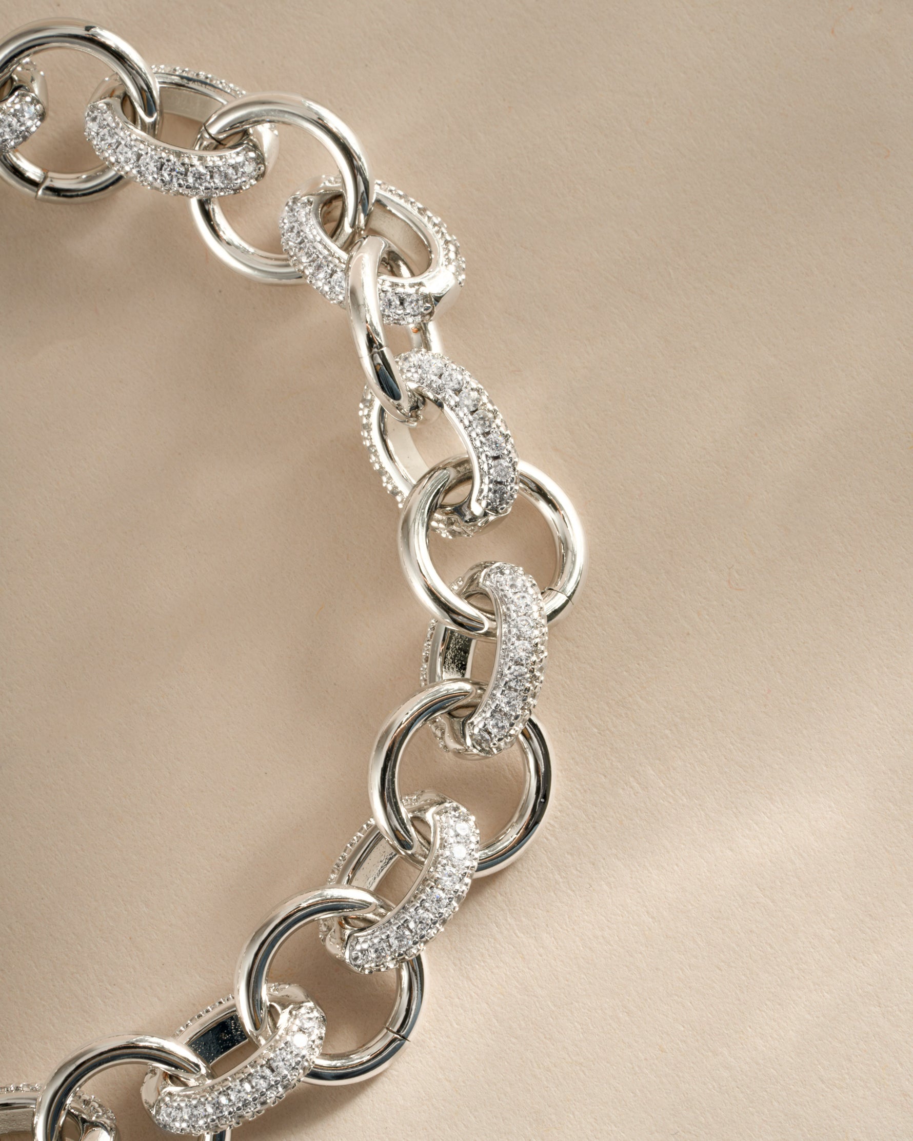 Silver Sami Jewels round pave link chain bracelet with intricate detailing and a secure clasp.