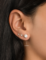 round solitaire stud earrings 6.5mm sterling silver on model