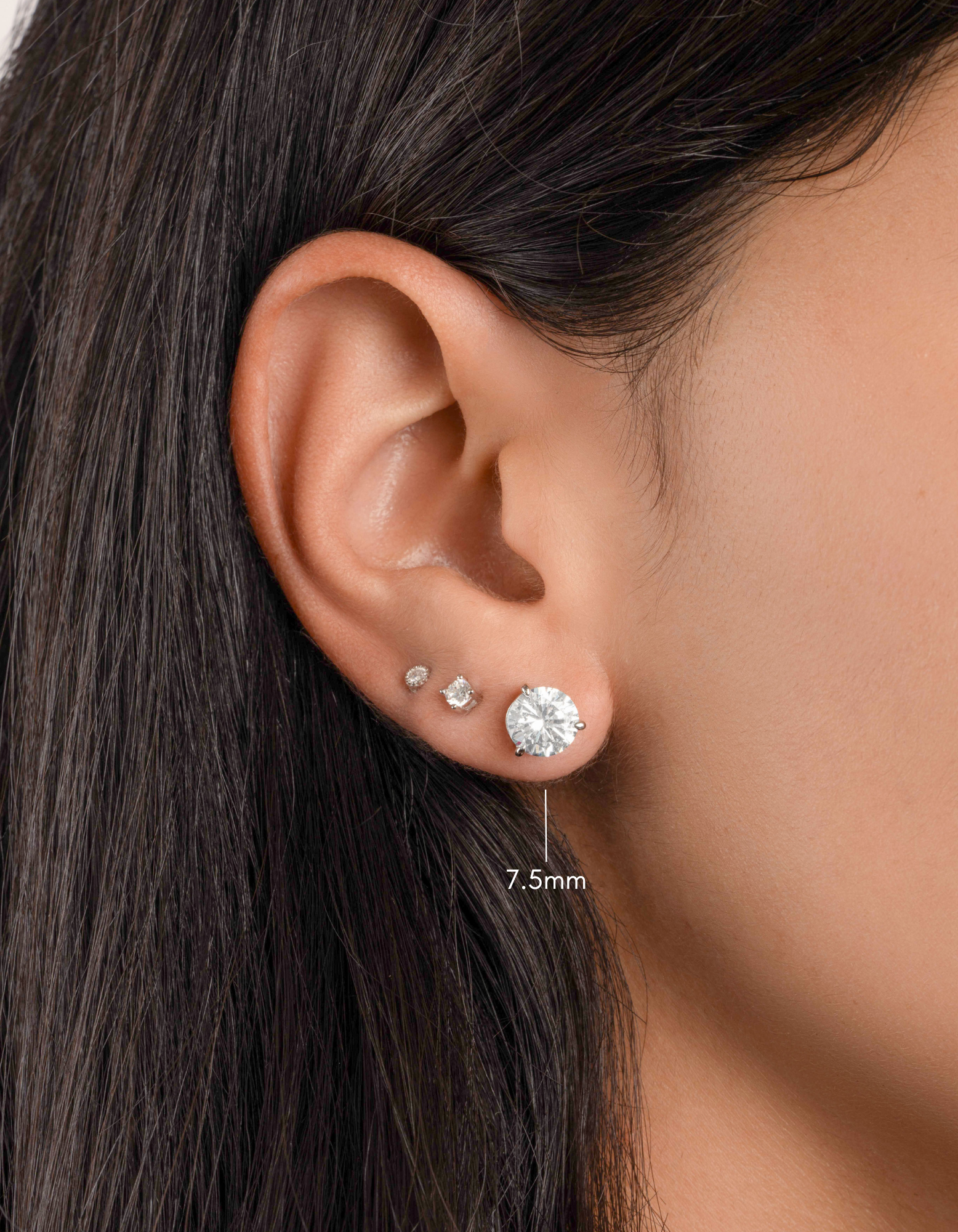 Sami Jewels 7.5mm round solitaire sterling silver stud earrings with a sleek, minimalist design.