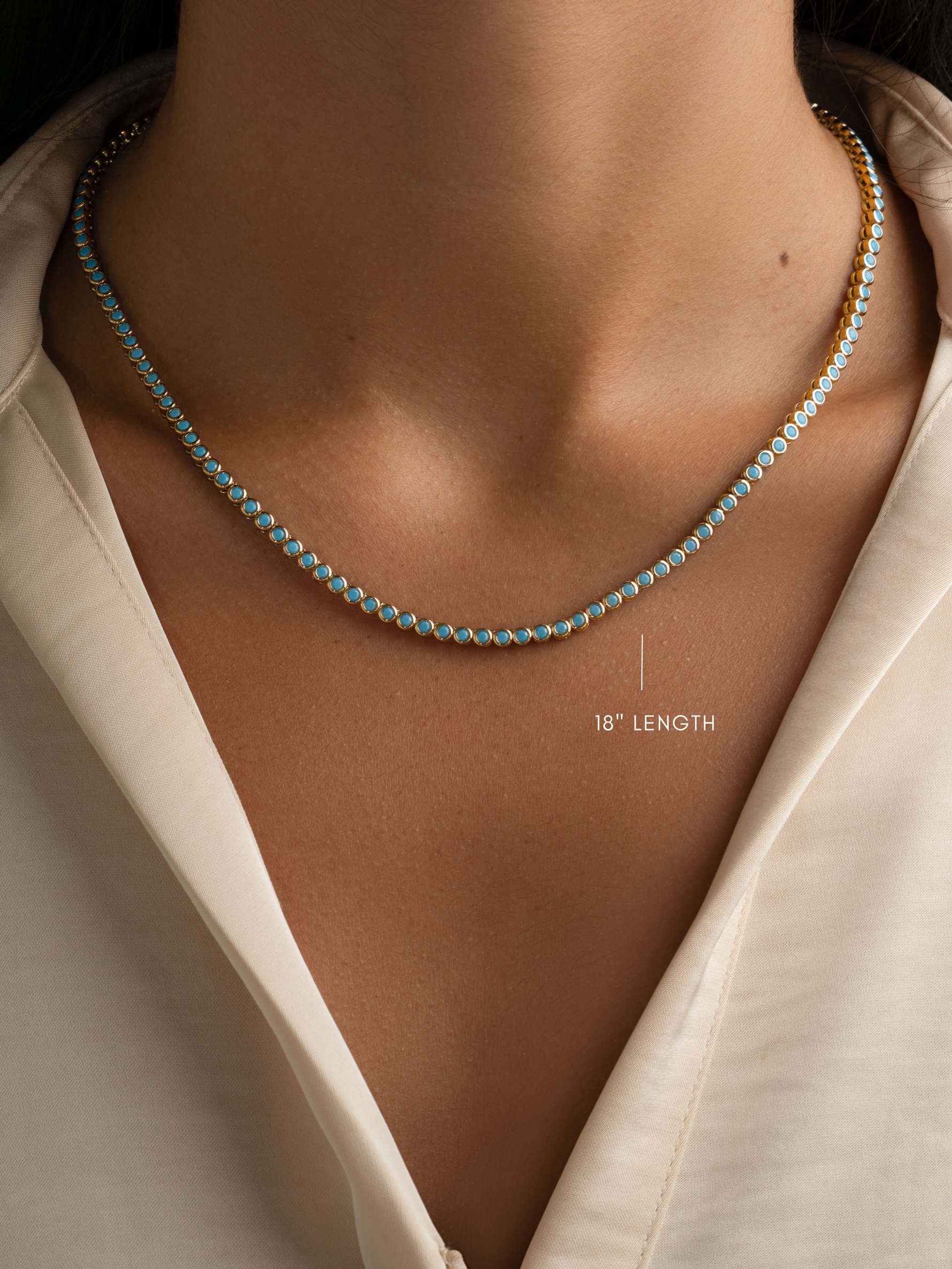 Round turquoise tennis necklace by Sami Jewels featuring gold chain and vibrant turquoise stones, 18-inch length.