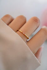 ruby 3 stone stacking ring in gold on model