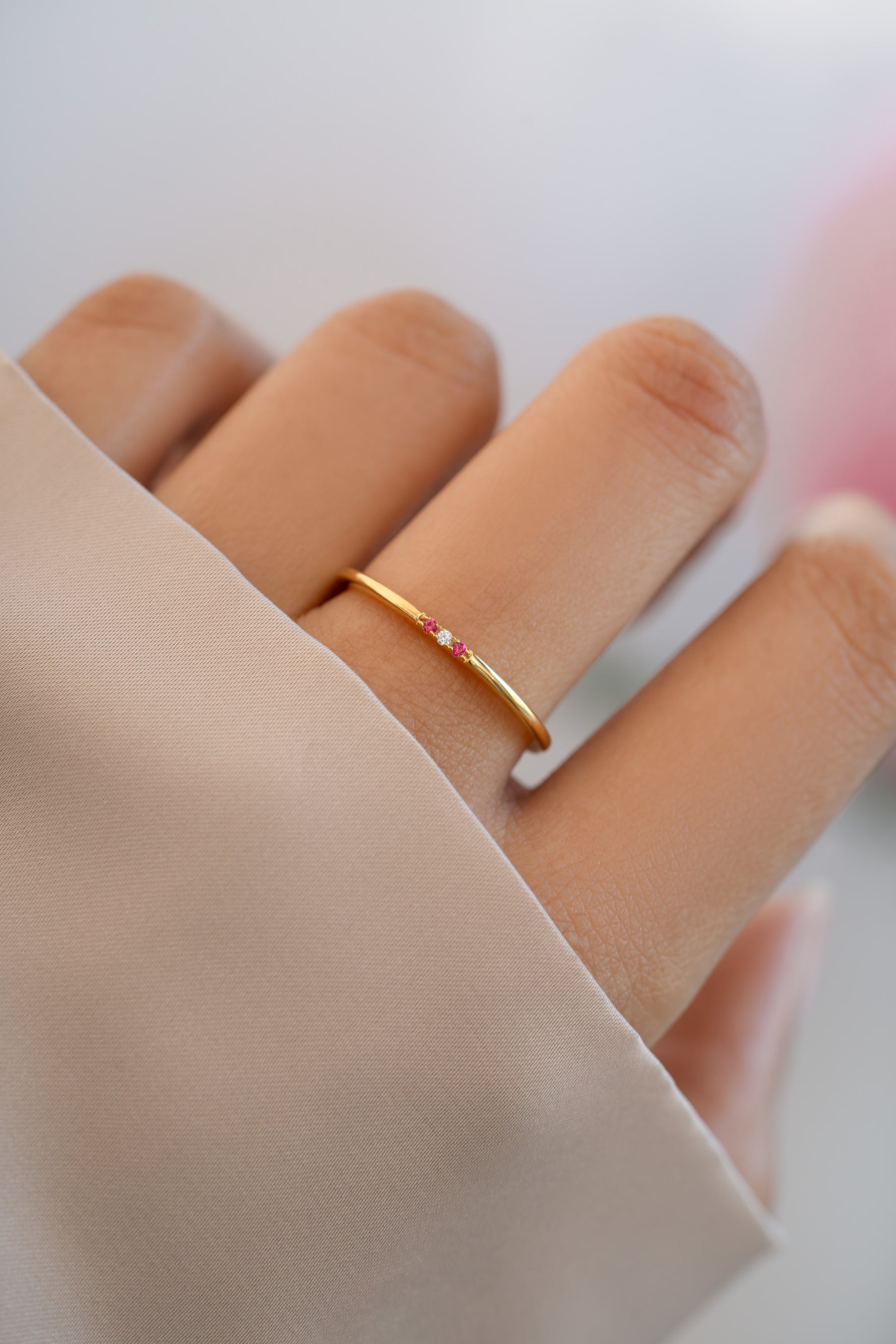 ruby 3 stone stacking ring in gold on model