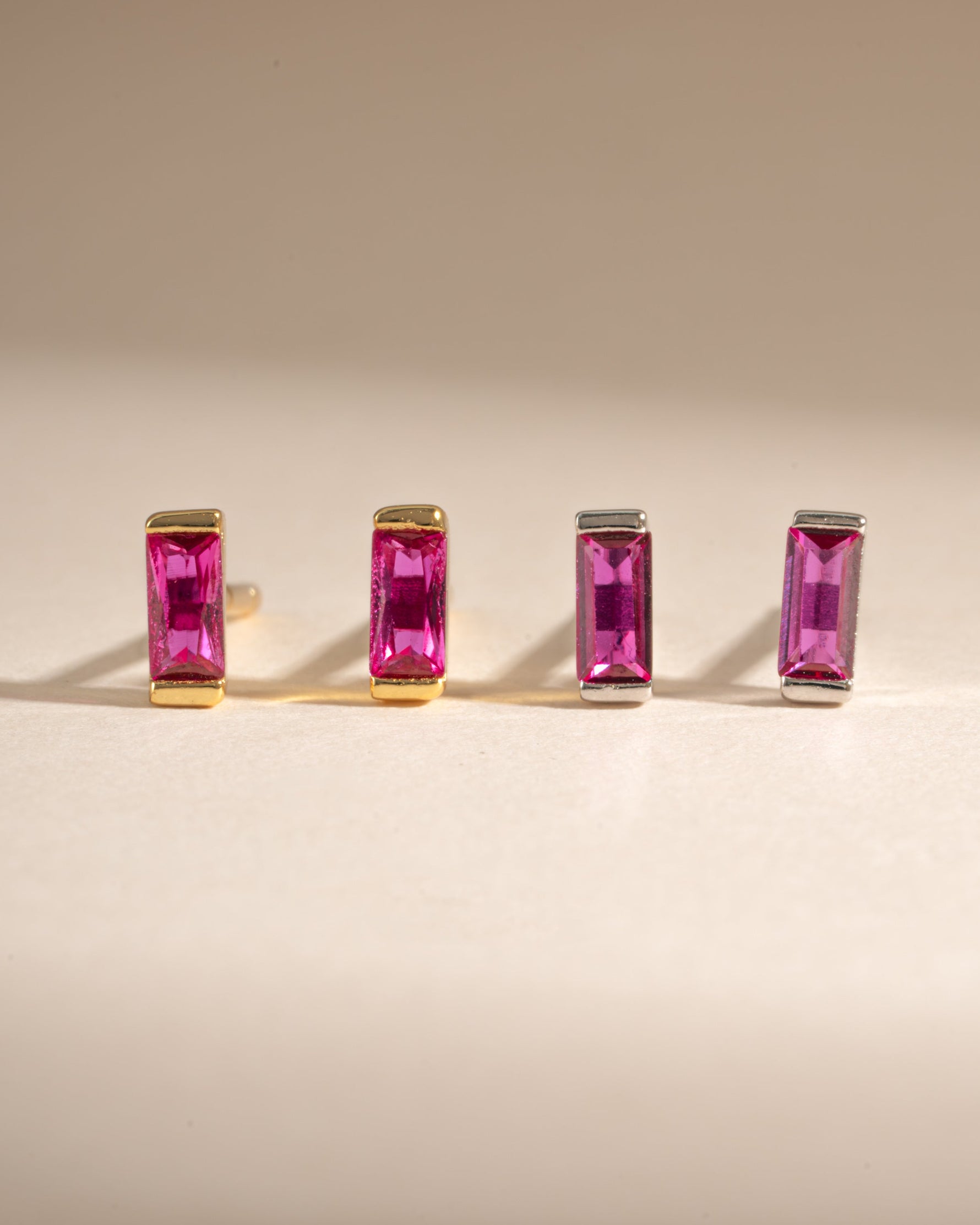 Gold and sterling silver Ruby Baguette Stud Earrings by Sami Jewels featuring sparkling rectangular rubies and sleek earring design.