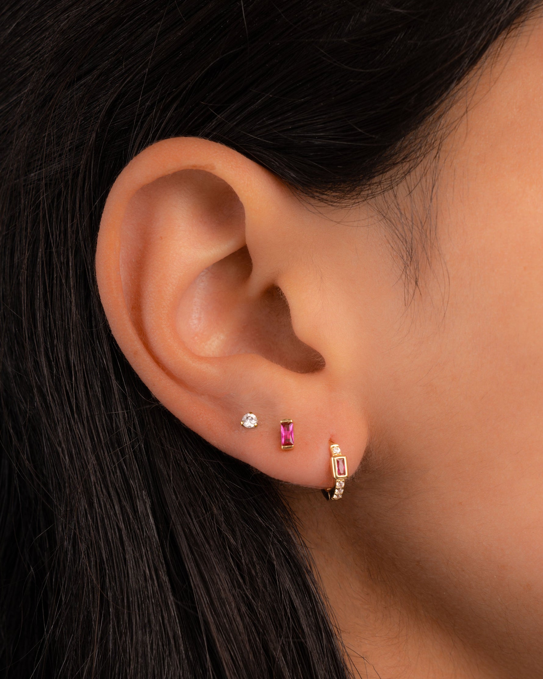 Gold Sami Jewels ruby baguette stud earrings featuring rectangular-cut rubies set in a sleek, elegant design.