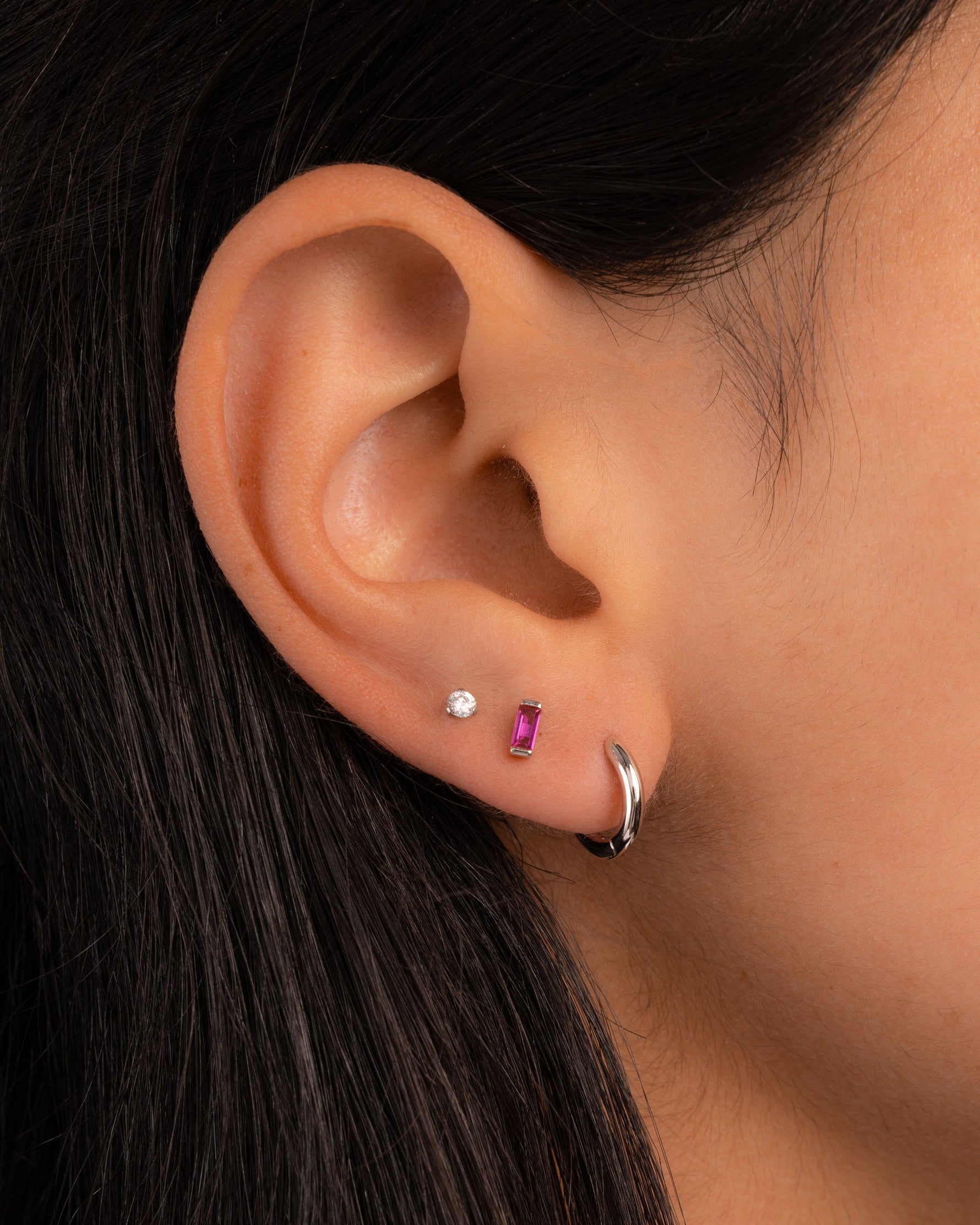Sterling silver Ruby Baguette Stud Earrings by Sami Jewels featuring sparkling red rubies and sleek modern design.
