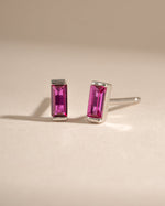 Sterling silver Ruby Baguette Stud Earrings with rectangular cut gemstones, elegant and sparkling for everyday wear.
