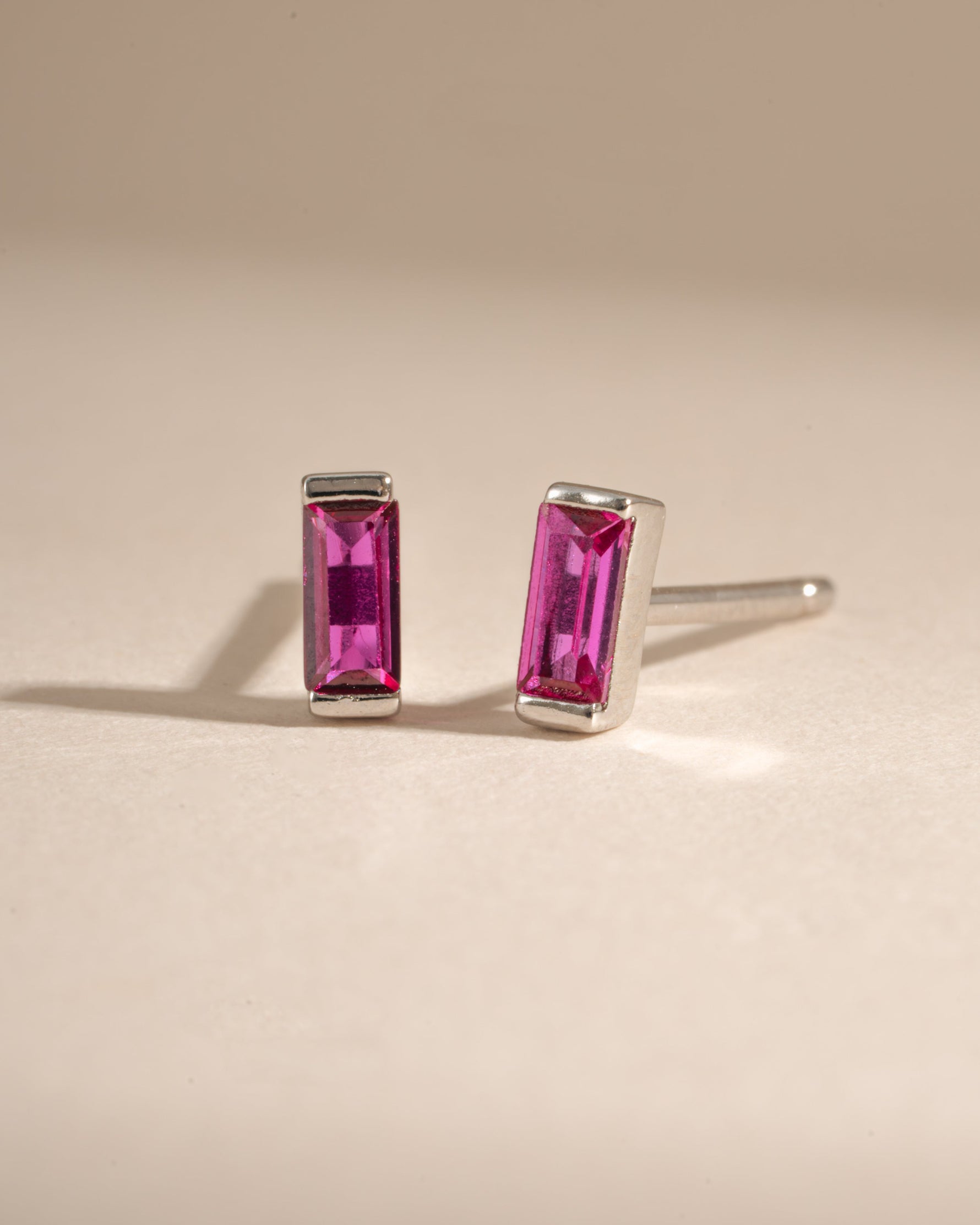 Sterling silver Ruby Baguette Stud Earrings with rectangular cut gemstones, elegant and sparkling for everyday wear.
