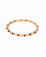 Sami Jewels Lilly Tennis Bracelet with ruby gemstones on gold chain link design, elegant jewelry accessory for women