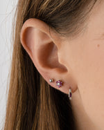Sterling silver Ruby Flower Stud Earrings with CZ center stone from Sami Jewels, showcasing detailed floral design and sparkling gemstone.