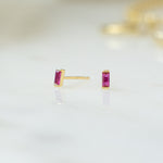 closeup image of ruby tiny earrings