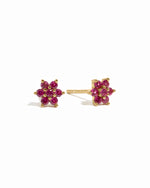 Gold Ruby Flower Stud Earrings by Samijewels-527 with vibrant red ruby flower design on a white background.
