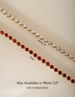 Sami Jewels Ruby Bezel Tennis Necklace featuring vibrant red rubies set in a sleek tennis necklace design.
