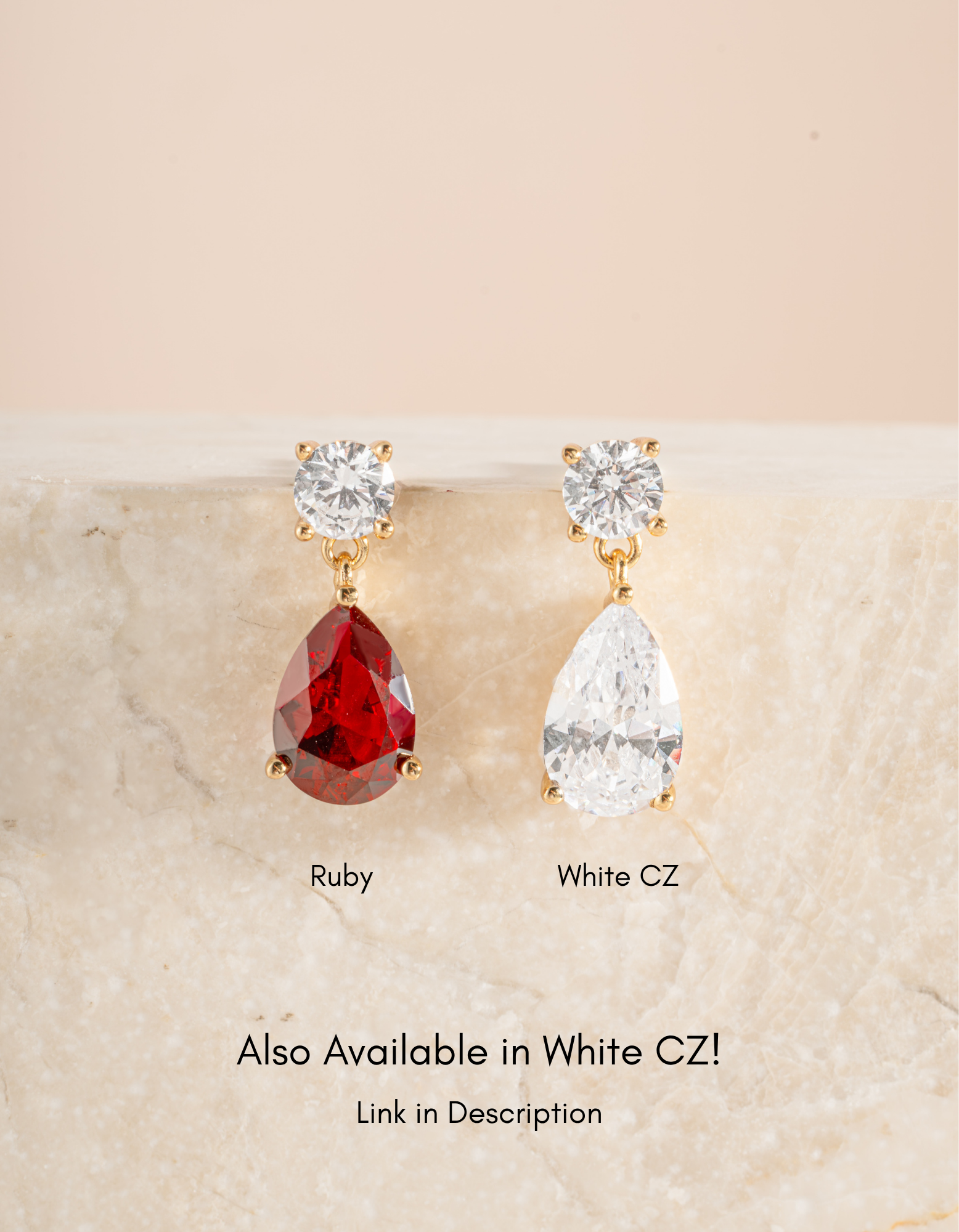 Gold and diamond pearl drop earrings with ruby teardrops from Sami Jewels, showcasing elegant jewelry design.