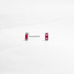 closeup image of ruby birthstone tiny studs earrings 