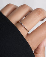 model wearing sterling silver 3 stone cz ring 