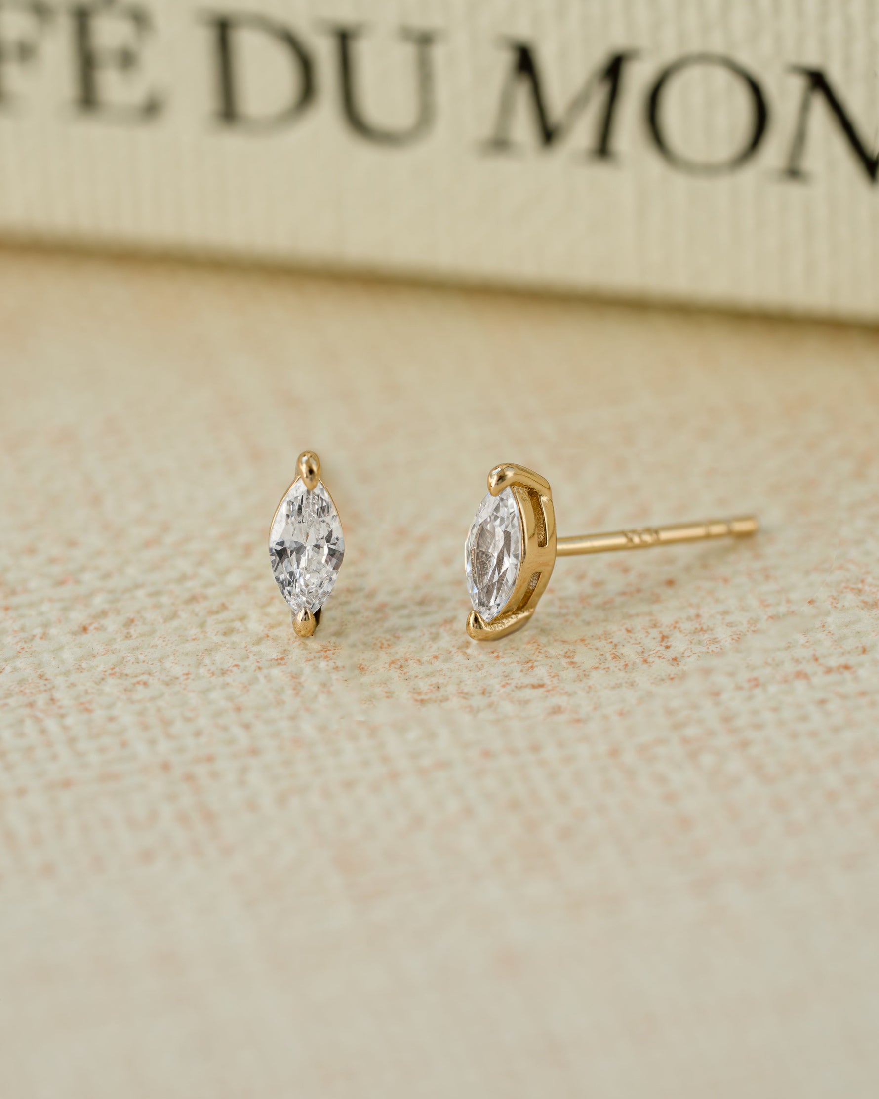 Gold marquise cut cubic zirconia earrings