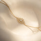 closeup image of gold slave bracelet hand chain