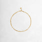 Closeup image of gold dainty anklet set
