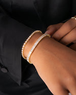 gold baguette bracelet with cubic zirconia stones