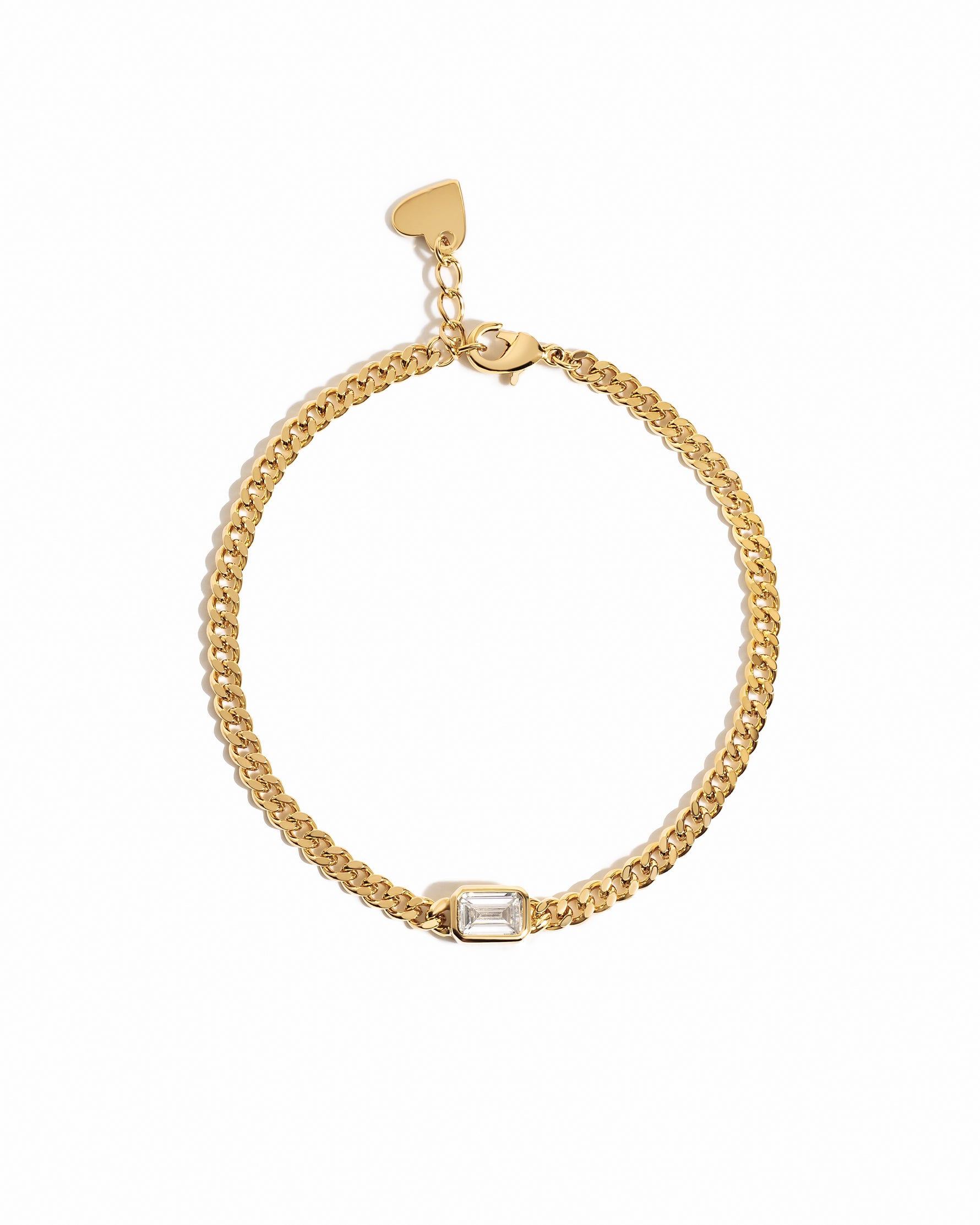 Gold chain bracelet with a bezeled baguette stone