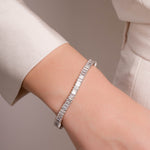 Model wearing silver diamond bracelet 