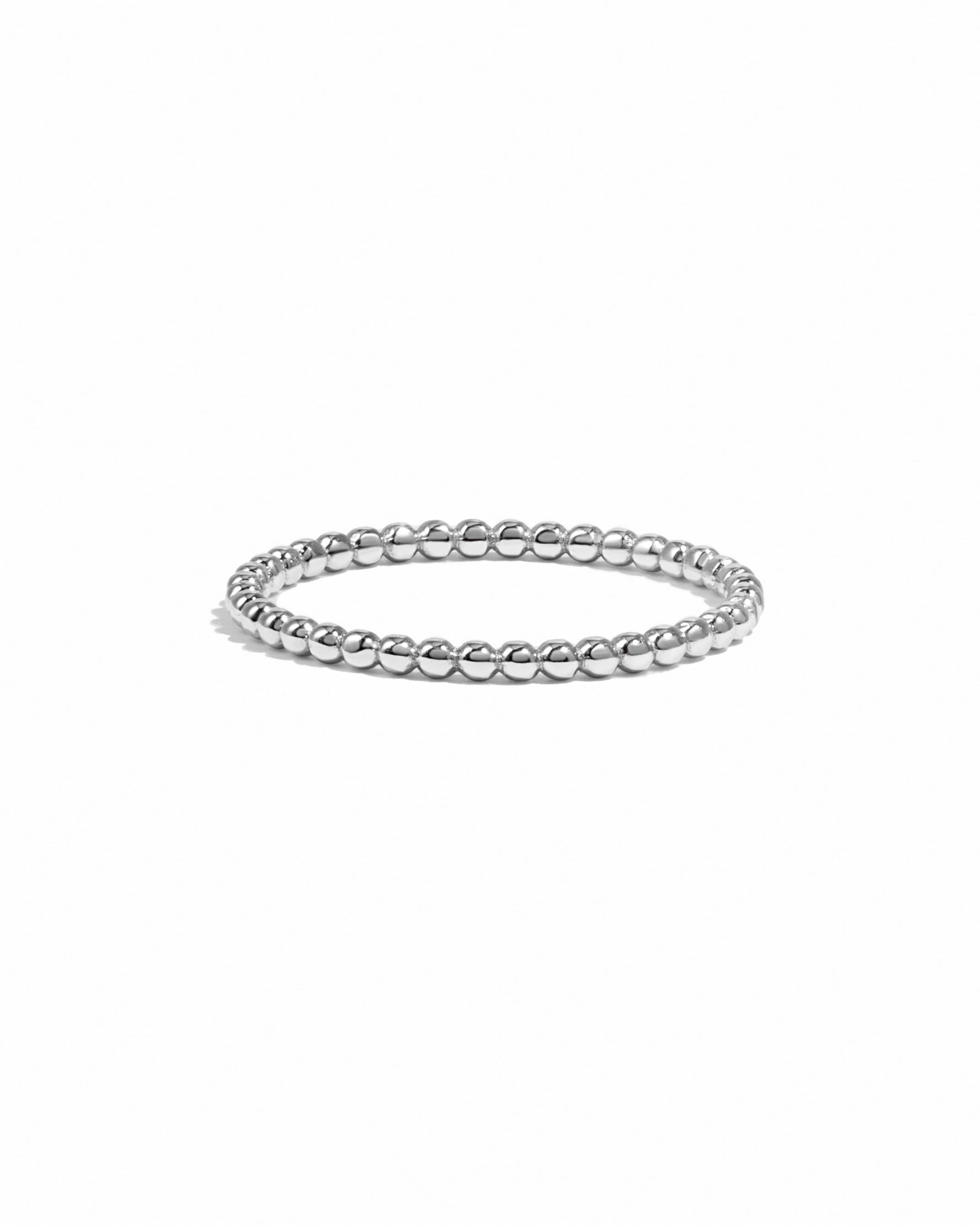 sterling silver plain beaded bracelet on a white background
