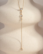 Gold bezel set dainty Y necklace