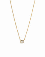 Sami Jewels dainty gold necklace with a diamond bezel pendant on a white background