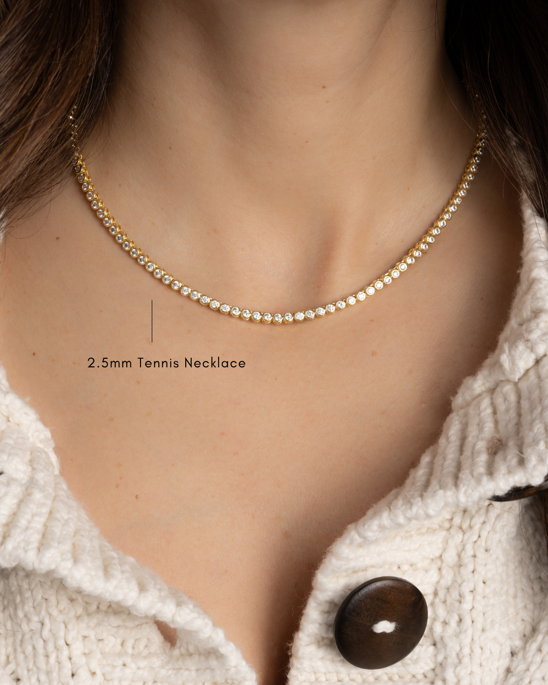 model wearing gold bezel tennis bracelet 