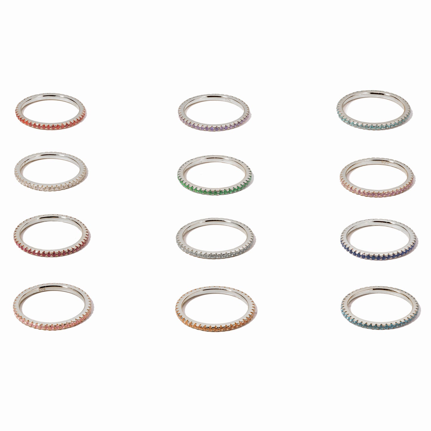 closeup image of thin birthstone eternity rings