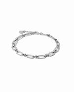 closeup image of silver chain link bracelet 