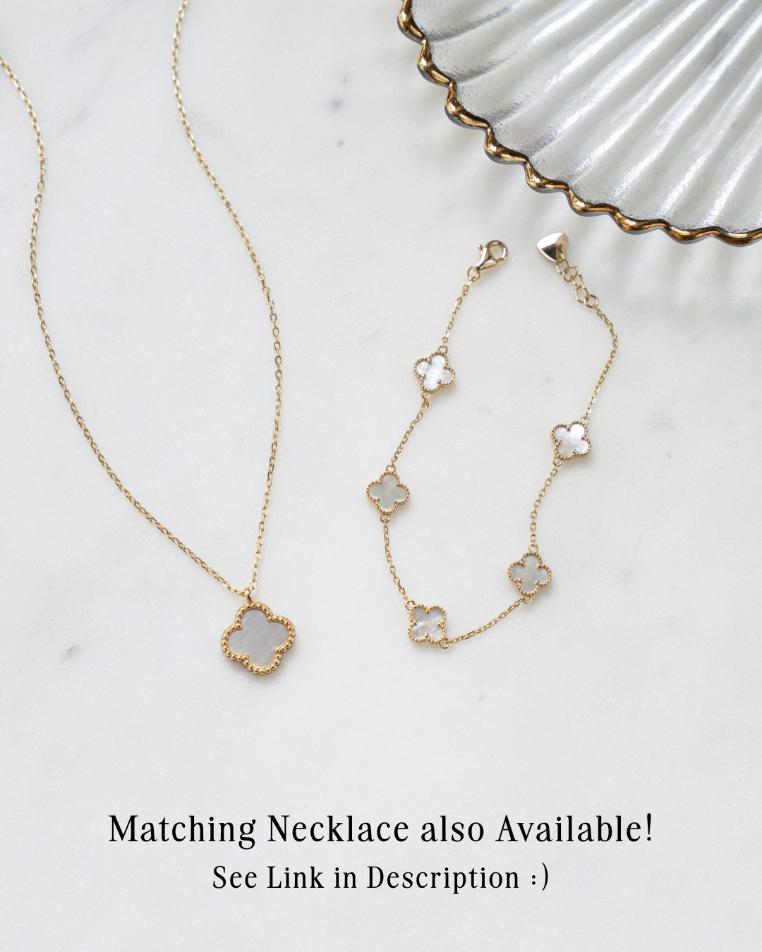 gold clover necklace paired with gold clover charm bracelet