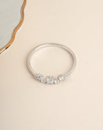 Sterling silver bridesmaid jewelry featuring a diamond stacking ring