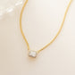gold cubic zirconia halo emerald cut diamond necklace 